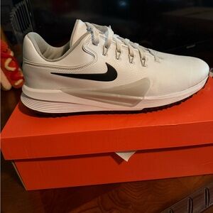 Nike Men's White Athletic Shoes with Black Swoosh